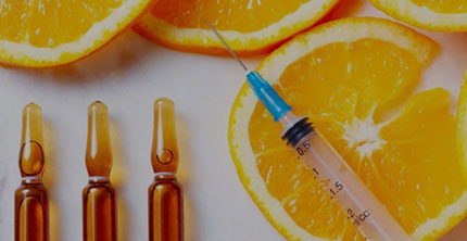 Image showing vitamin shots orange peels and syringe